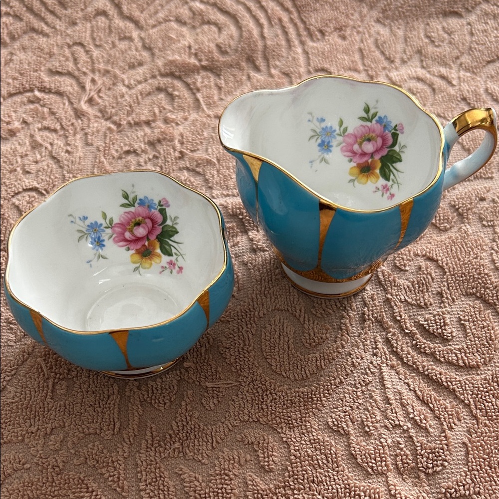Stunning turquoise blue Queen Anne bone china cream & sugar set.